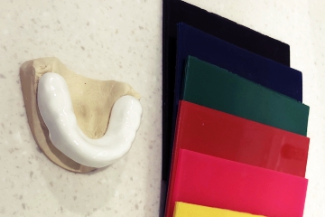 A custom made mouthguard fitted by one of our dentists can greatly reduce the risk of injury while playing sport