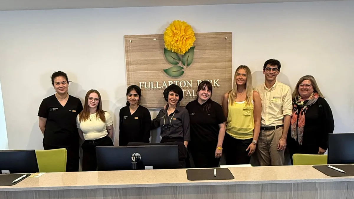 Fullarton Park Dental team behind the reception desk on R U OK? Day 2026